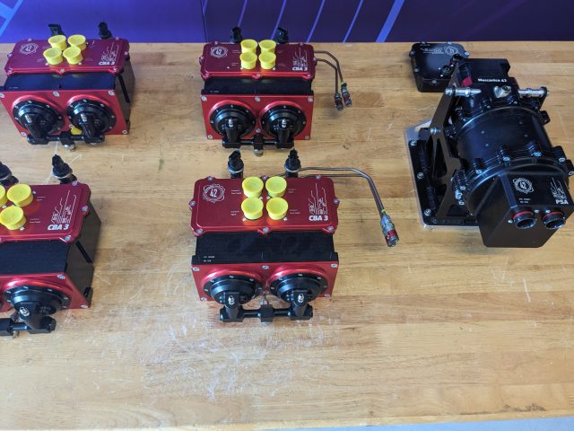 red-anodized actuators