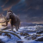 A dark, snowy vista with a single mammoth walking past the rib cage of another of its kind.