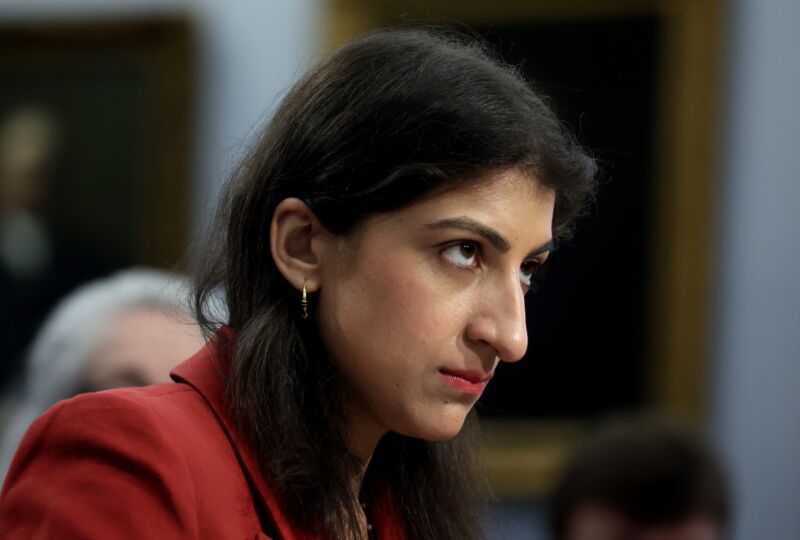 FTC Chair Lina Khan sitting at a Congressional hearing