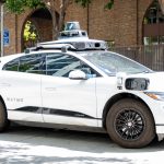 A Waymo self-driving car in front of Google's San Francisco headquarters, San Francisco, California, June 7, 2024.