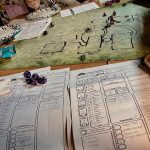 A Dungeons & Dragons game session featuring a map, miniatures, dice, and character sheets