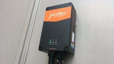 A Juicebox EVSE mounted to a wall