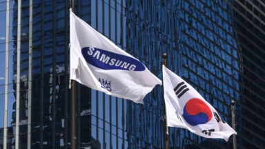 Samsung and South Korea flags in the wind