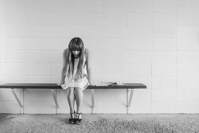 Woman sitting on a bench by Ryan McGuire?width=698&height=466&fit=crop&auto=webp