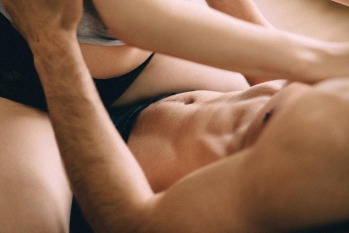 woman laying on top of man in underwear by Freestocksorg?width=698&height=466&fit=crop&auto=webp