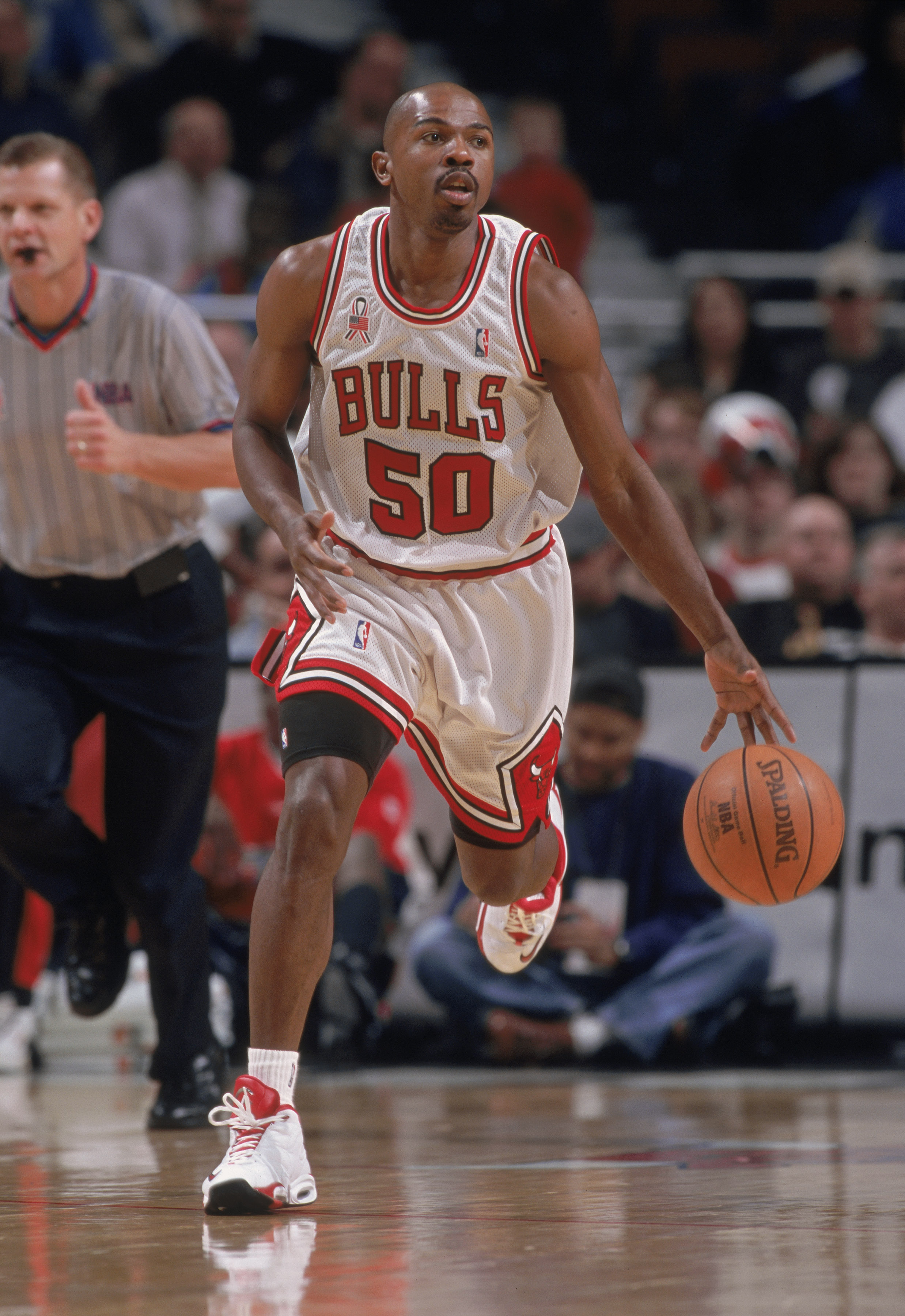 4 Dec 2001:  Point guard Greg Anthony #50 of the Chicago Bulls dribbles the ball during the NBA game against the Houston Rockets at the United Center in Chicago, Illinois.  The Bulls crushed the Rockets 103-75.Mandatory Credit:  Jonathan Daniel/Getty Imag