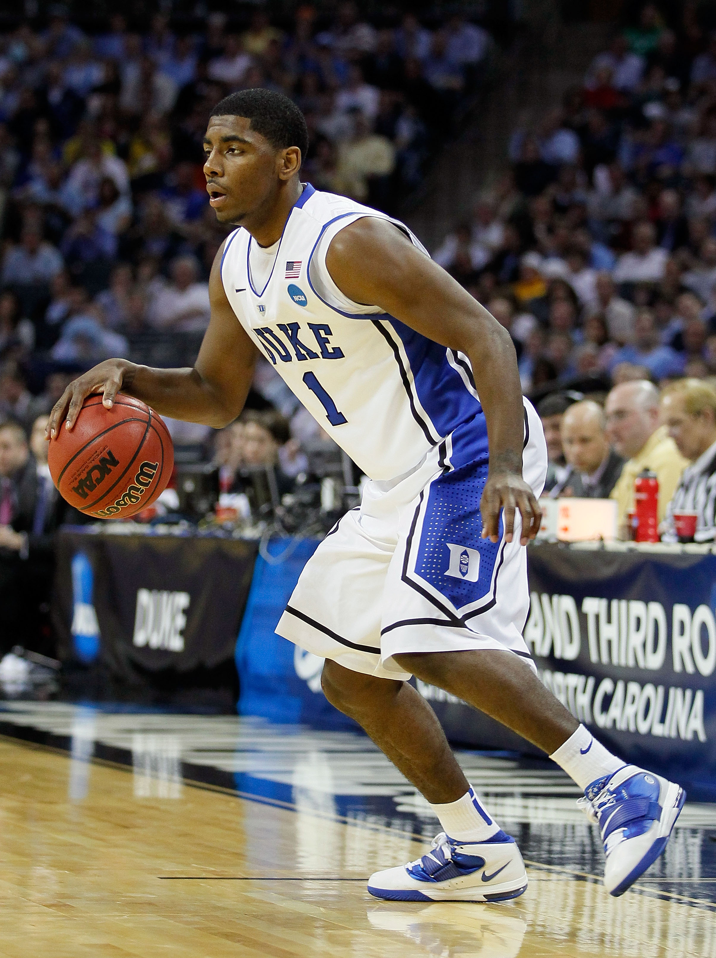 CHARLOTTE, NC - MARCH 20:  Kyrie Irving #1 of the Duke Blue Devils moves the ball while taking on the Michigan Wolverines during the third round of the 2011 NCAA men's basketball tournament at Time Warner Cable Arena on March 20, 2011 in Charlotte, North