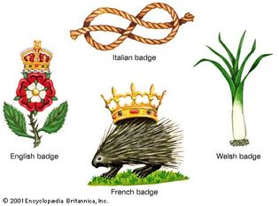 The image shows four badges. The Italian badge looks like a rope; the Welsh badge looks like a leek; the French badge looks like a hedgehog wearing a crown; and the English badge looks like a rose wearing a crown.