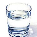 water glass on white background. (drink; clear; clean water; liquid)