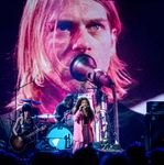 Lorde performing with Joan Jett and the surviving members of Nirvana