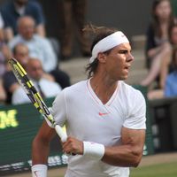 Rafael Nadal of Spain returns ball during second round match against Robin Haase of the Netherlands at Wimbledon in London, England on June 24, 2010