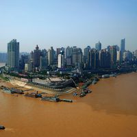 Skyline of the Chongtianmen area, at the confluence of the Yangtze (left) and Jialing (right) rivers, Chongqing, China.