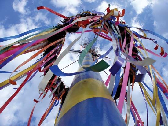 Maypole decorated with streamers.