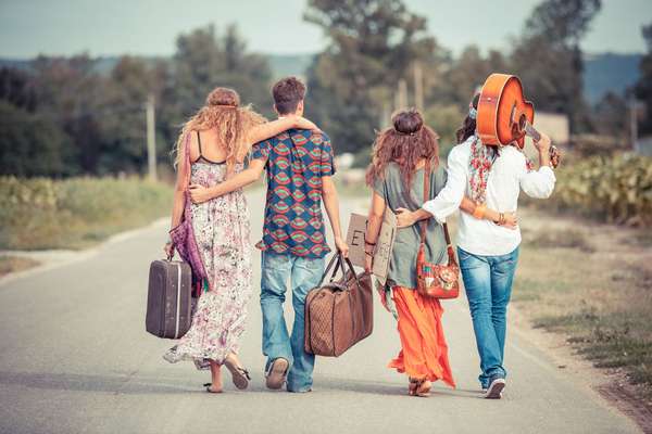 Hippie Group Walking on a Countryside Road