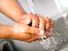 Hand washing. Healthcare worker washing hands in hospital sink under running water. contagious diseases wash hands, handwashing hygiene, virus, human health