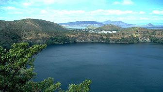 Asososca Lagoon, Lake Nicaragua, with oil refinery in the background, Nicaragua