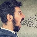 Man screaming with alphabet letters flying from his mouth (anger, rage, aggression, emotions).