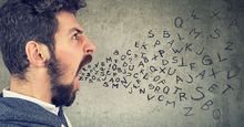 Man screaming with alphabet letters flying from his mouth (anger, rage, aggression, emotions).