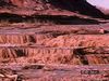 Watch a desert thunderstorm and resulting flash flood scour the sandy soil and terrain