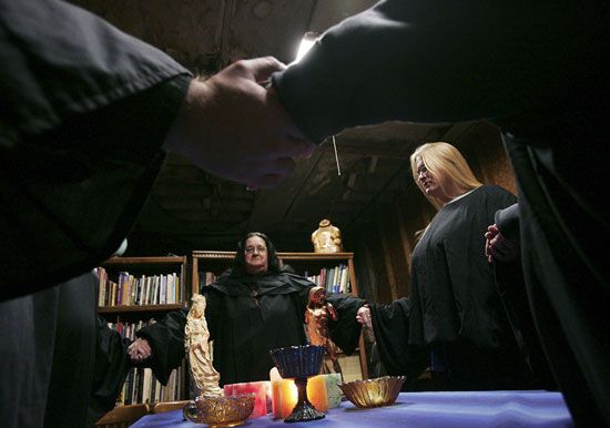 Wiccan high priestess celebrating a lunar ritual