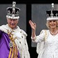 King Charles III and Queen Camilla (Camilla, Queen Consort) wave from the balcony of Buckingham Palace during the Coronation of King Charles in London, England on May 6, 2023