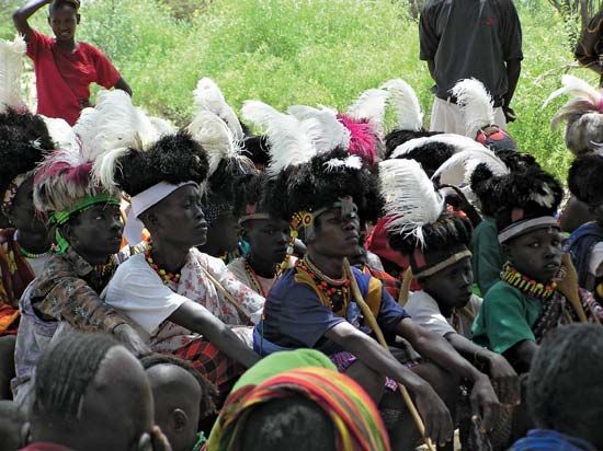 Turkana youth wearing traditional headresses