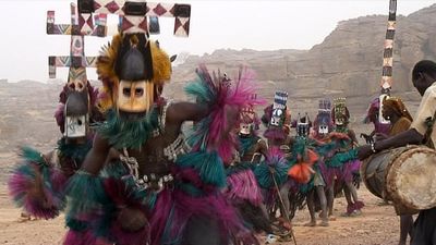 Observe the Dogon dancers of Mali performing wearing Kanaga masks