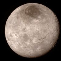 Remarkable new details of Pluto's largest moon Charon are revealed in this image from New Horizons' Long Range Reconnaissance Imager (LORRI), taken late on July 13, 2015 from a distance of 289,000 miles