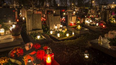 All Saints Day. All Souls Day. Candles in cemetery in Poland on All Saints Day, November 1. All Souls Day, November 2. Christian church, All Hallows, Solemnity of All Saints, Feast of All Saints, purgatory, Roman Catholic church