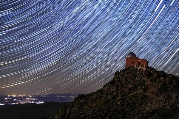 Astronomical Observatory of the Mojon del Trigo. Long exposure using the star trail technique. Sierra Nevada National Park, in the province of Granada, Andalusia.