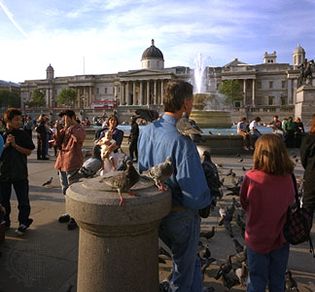 Trafalgar Square, London, with the National Gallery in the background. The gallery was moved to its present location at the northern end of the square in 1838.