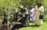 Wangari Maathai (with shovel), winner of the 2004 Nobel Peace Prize, participates in a tree planting ceremony in the North Garden of UN Headquarters, 2005