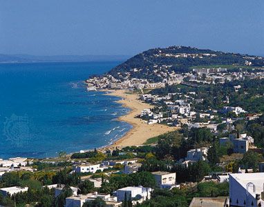 Low-lying coast on the Gulf of Tunis, at Al-Marsā, northeastern Tunisia.