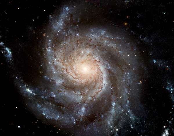 M101 (NGC 5457, The Pinwheel Galaxy). Hubble Space Telescope image of face-on spiral galaxy Messier 101 (M101). Largest most detailed photo of a spiral galaxy that has ever been released from Hubble. Created from 1994-2003