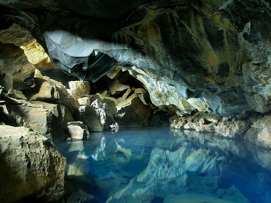 Cave pool thermal spring in Grjotagja Cave, near Myvatn lake in Iceland. Groundwater. Lava cave