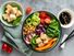 Buddha bowl - vegetarian meal - tofu spinach carrots chickpeas radish tomatoes cucumber cabbage