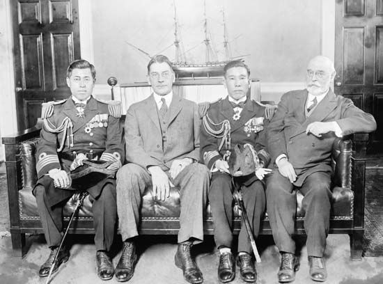 (Left to right) Capt. Yamamoto Isoroku, Japanese naval attaché in Washington, D.C., U.S. Secretary of the Navy Curtis D. Wilbur, another Japanese naval officer, and Adm. Edward W. Eberle, chief of U.S. naval operations, Feb. 17, 1926.