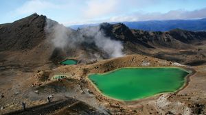 Steam rising from Emerald Lake in Tongariro National Park, Waikato, N.Z.