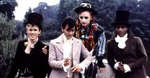 British musical group Culture Club on the set of the "Karma Chameleon" video, 1983; (left to right) Roy Hay, Jon Moss, Boy George and Mikey Craig.