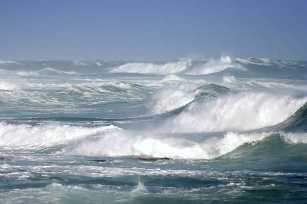 Large ocean waves breaking on a stormy day. (wave; sea; whitecaps; storm)