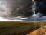 Thunderstorm cloud-to-ground lightning discharge with cumulonimbus clouds in field. weather storm thunderstorm atmospheric disturbance cumulonimbus clouds thunder and lightning Homepage blog 2011, science and technology