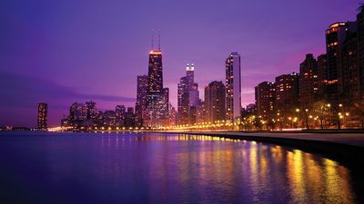 USA, Illinois, Chicago skyline and Lake Michigan, night