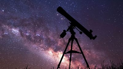 Infinite space background with silhouette of telescope. This image elements furnished by NASA.