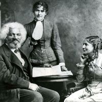 Frederick Douglass with his second wife Helen Pitts Douglass (sitting) and sister-in-law, Eva Pitts (standing).