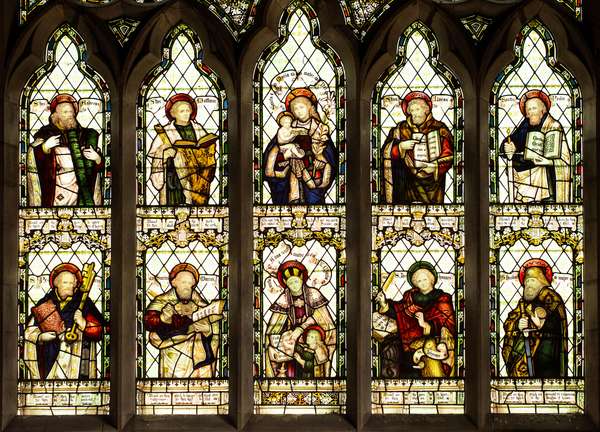 Stained glass window showing ten Christian saints. St Peters Church, Cound, Shropshire, England.