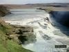 View an Icelandic waterfall and learn about its geologic life cycle and erosion into a smooth riverbed