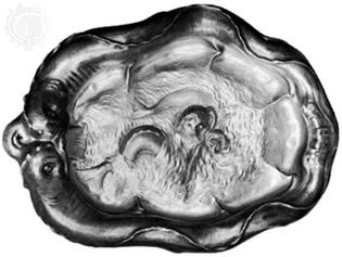 silver dish in the auricular style