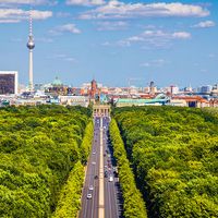 Aerial view of Berlin skyline panorama with Grosser Tiergarten public park on a sunny day with blue sky and clouds in summer, Germany.