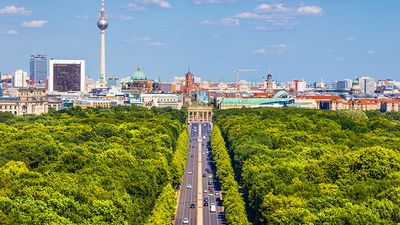 Aerial view of Berlin skyline panorama with Grosser Tiergarten public park on a sunny day with blue sky and clouds in summer, Germany.