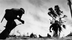 U.S. troops advancing on Tarawa, Gilbert Islands, in 1943